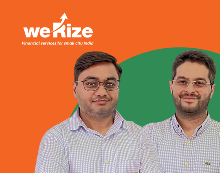 WeRize co-founders Vishal Chopra and Himanshu Gupta standing side-by-side below the company logo.