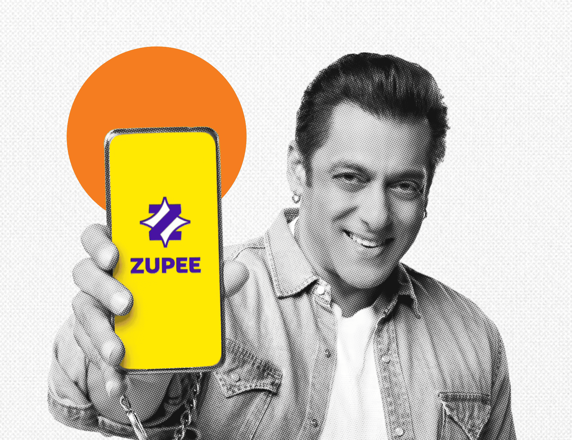 Actor Salman Khan smiling and holding up a smartphone that displays the yellow and purple Zupee app logo.