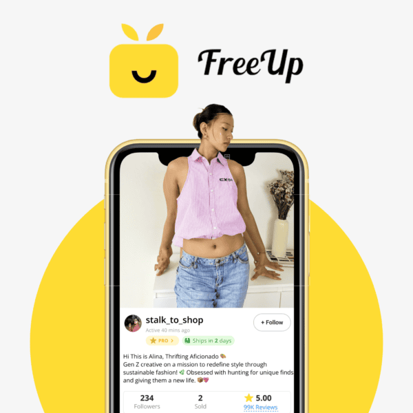 A promotional graphic featuring the yellow FreeUp smiling logo at the top. Below is a smartphone mockup set against a large yellow circular background. The phone screen displays a seller profile for 'stalk_to_shop' showing a woman wearing a pink striped top and blue jeans. Below the image is the seller's bio emphasizing sustainable fashion, 'PRO' status, a 2-day shipping badge, 234 followers, 2 items sold, and a 5.00-star rating