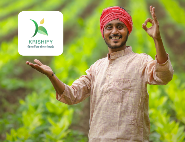 A smiling Indian farmer standing in a green field, gesturing toward the Krishify app logo floating above his hand.